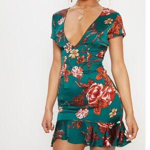 Emerald green cross cross back frill hem bodycon